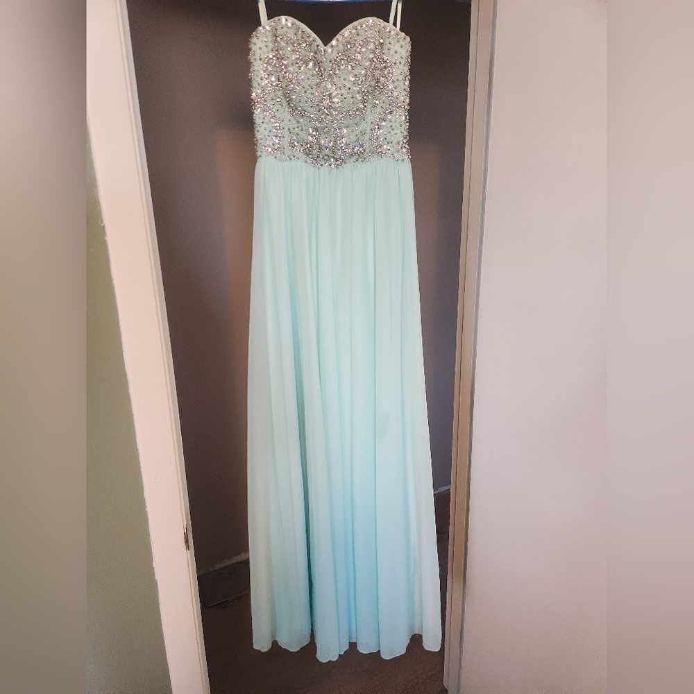 Elegant Light Blue Gown with Silver Embellishments